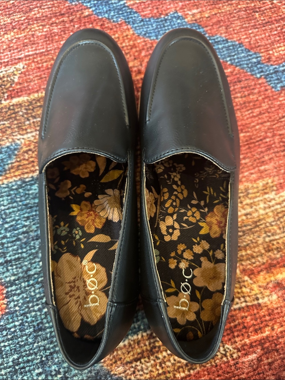 b.o.c. Black Slip-On Loafers with Floral Insole
